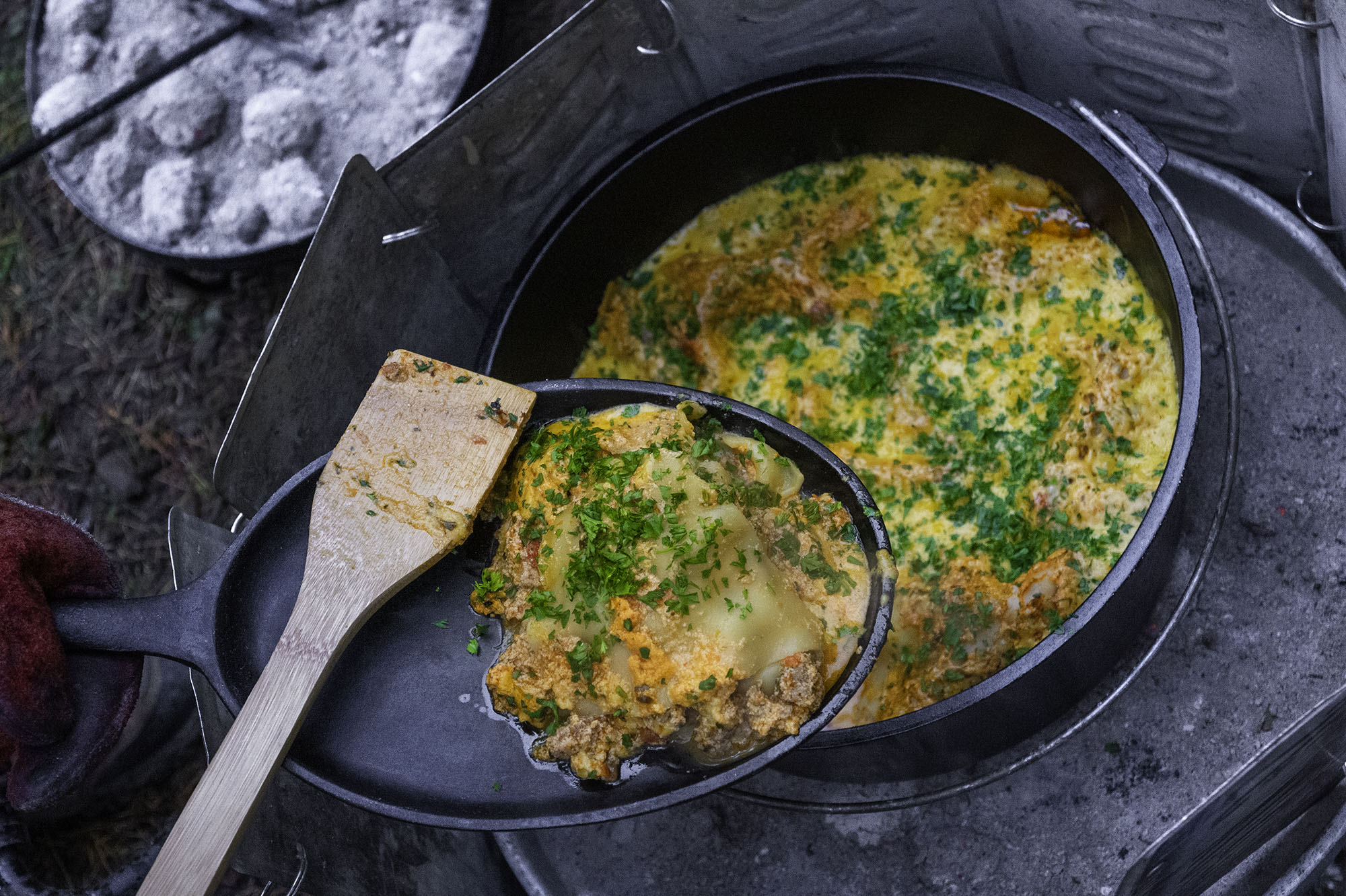 No-Boil Stack and Bake Lasagna in a Camp Cast Iron Dutch Oven